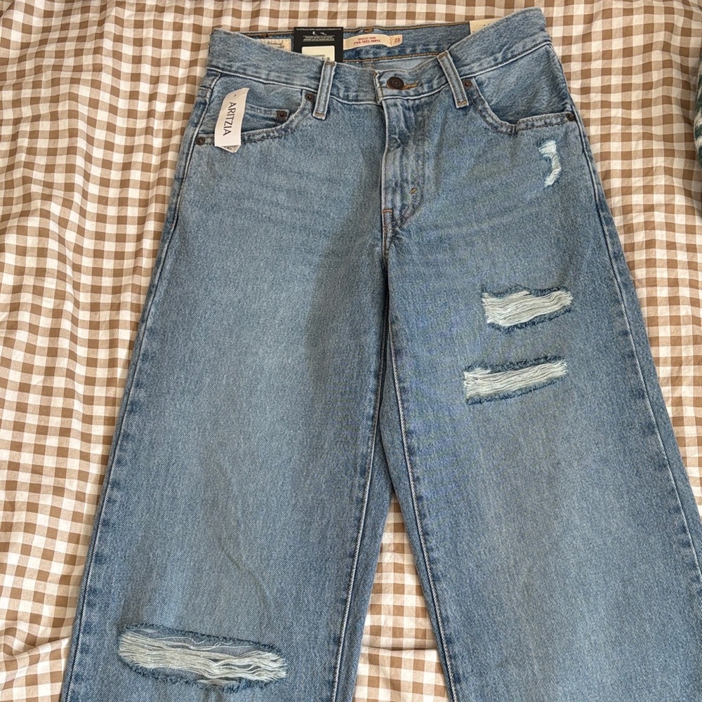 Levi's Light Blue Distressed Straight Leg Jeans